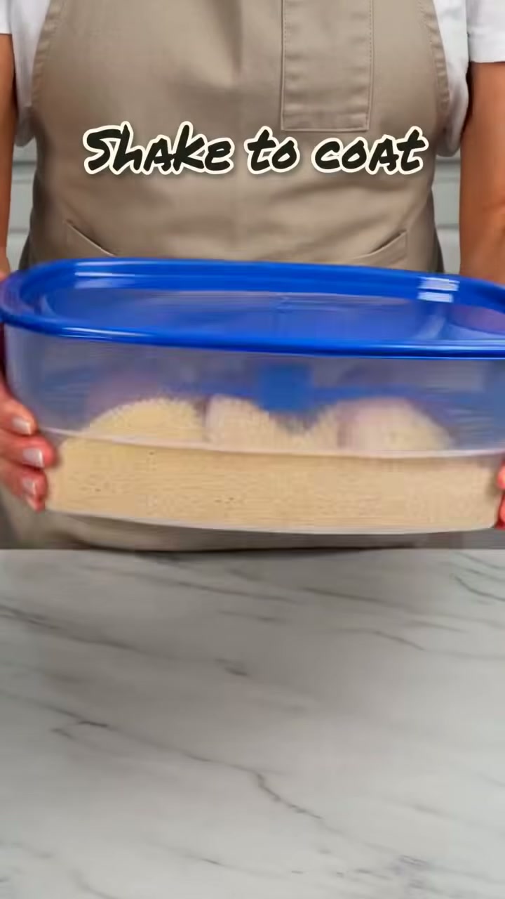 Add the food and crumbs, close the lid and shake to coat