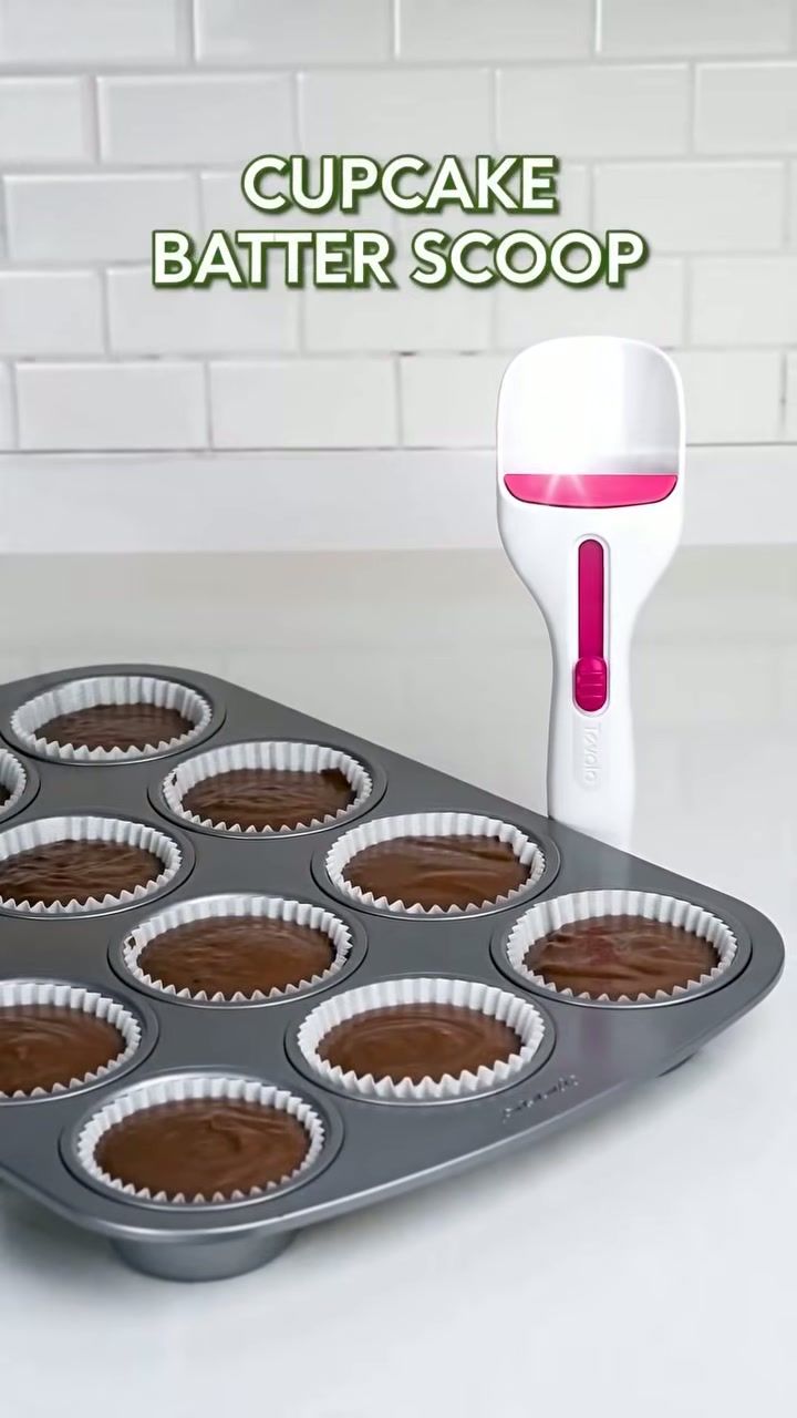 Twelve identical cupcakes with no drips or overfilled liners